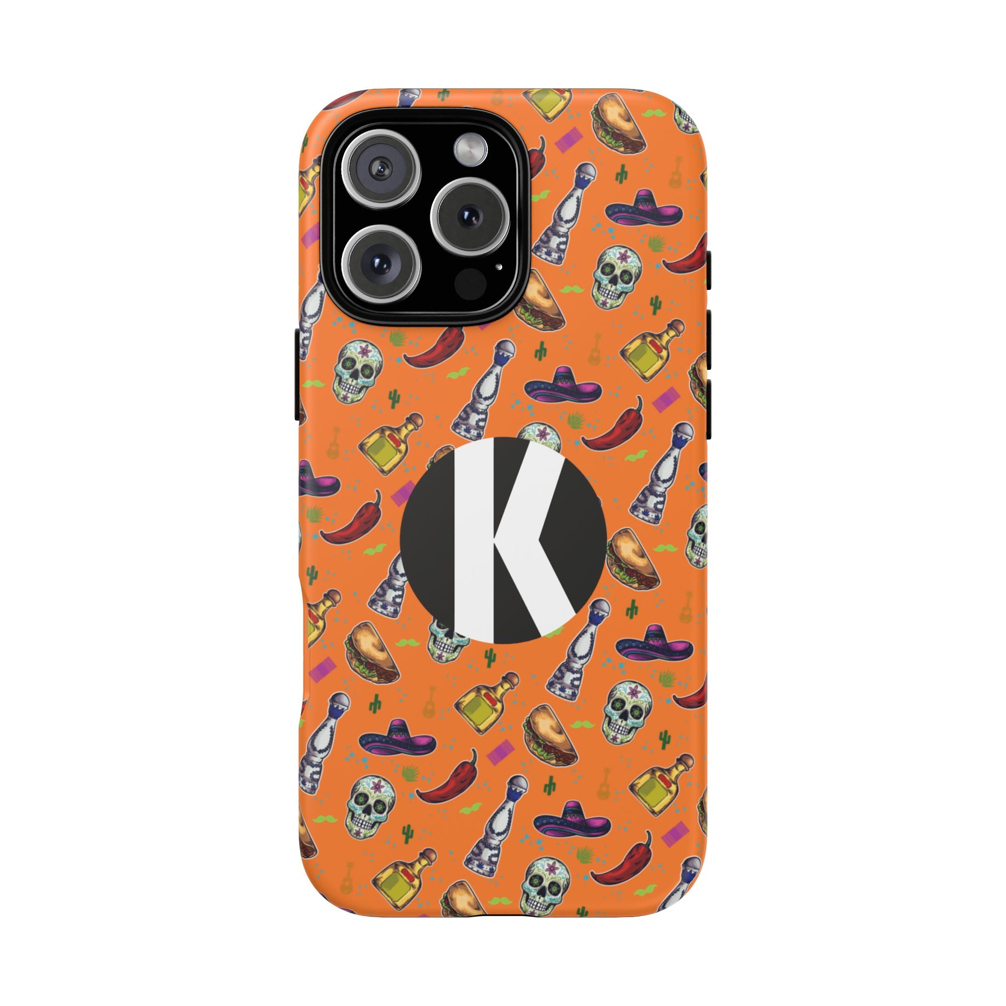 An orange phone case featuring a repeating Mexican-themed pattern of skulls, chili peppers, tequila bottles, and sombreros, with a large black circle containing a white letter 'K' on the back.