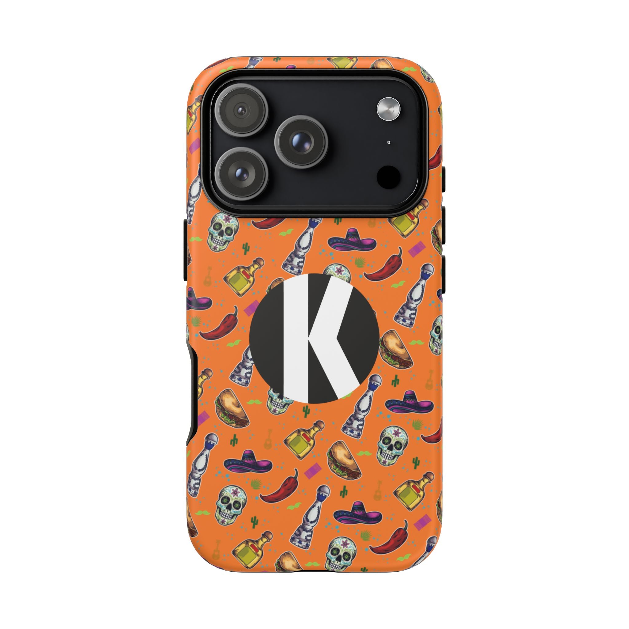 An orange phone case with a repeating pattern of skulls, sombreros, chili peppers, and tequila bottles, featuring a large black circle with a white letter 'K' on the back.