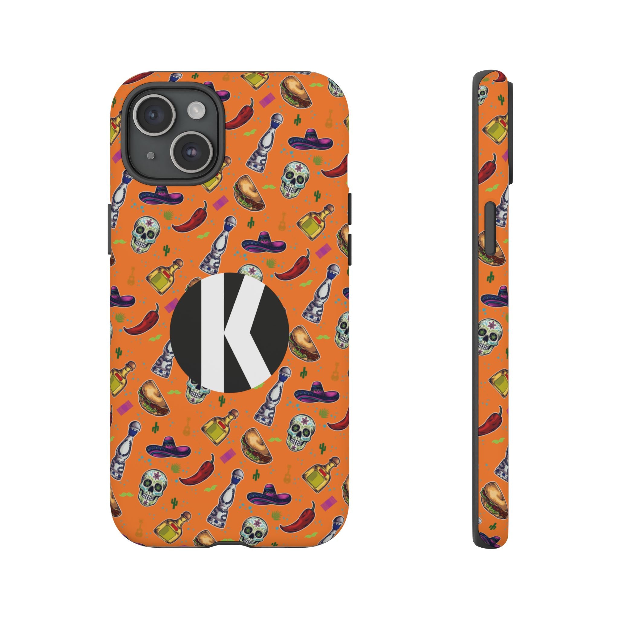An orange phone case with a Mexican-themed pattern of skulls, sombreros, chili peppers, and tequila bottles, featuring a large black circle with a white letter 'K' on the back. A side profile of the case is shown next to it on a plain white background.