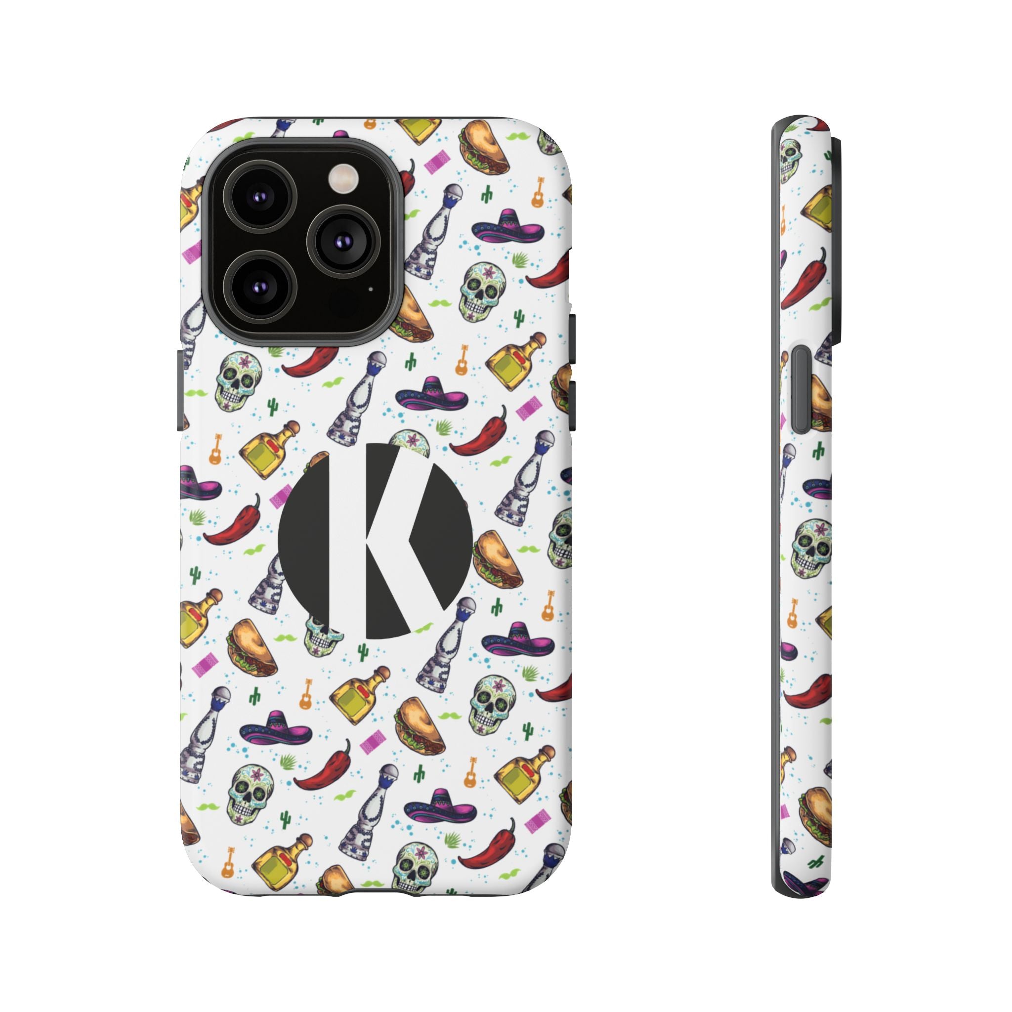 A phone case shown from the back and side on a plain white background. The case has a white base with a colorful repeating pattern of skulls, bottles, sombreros, and chili peppers, plus a large black circle containing a white letter K on the back.